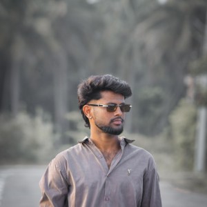 S THARUN